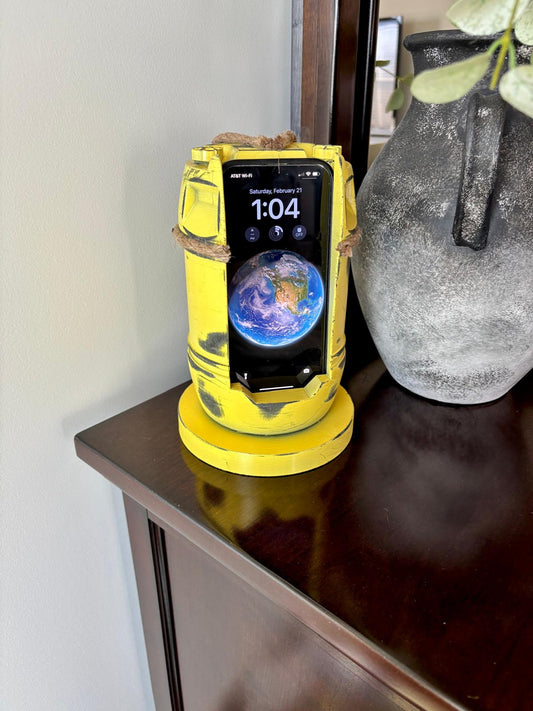 JAWS inspired yellow barrel smartphone charging dock